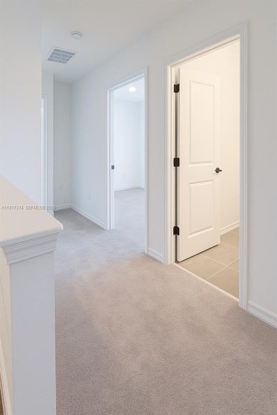 Spacious, unfurnished interior of a new home in The Townhomes at Bellalago, Kissimmee (Image 20).