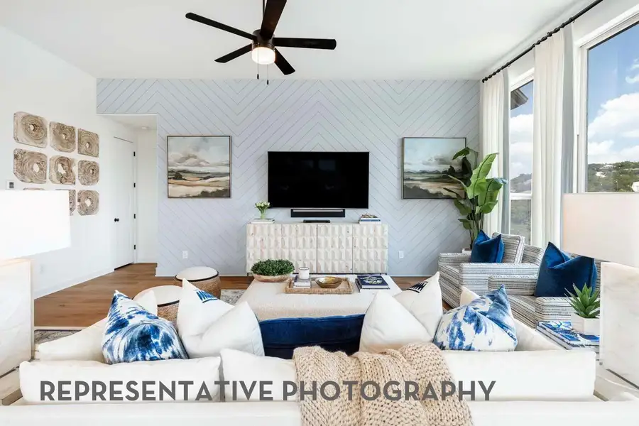 Furnished interior view inside a new home in ARTAVIA, Conroe (Image 9).