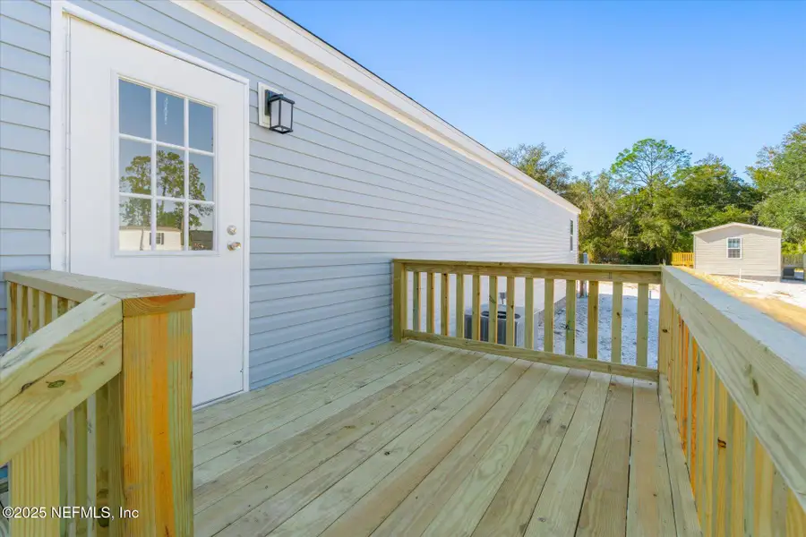 Exterior details and patio area of a home in , East Palatka (Image 2). Exterior details and patio area of a home in , East Palatka (Image 2).