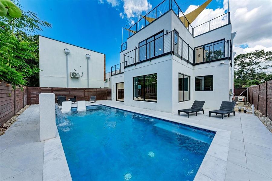 Front exterior of a new home in , Sarasota, FL, highlighting curb appeal (Image 24).