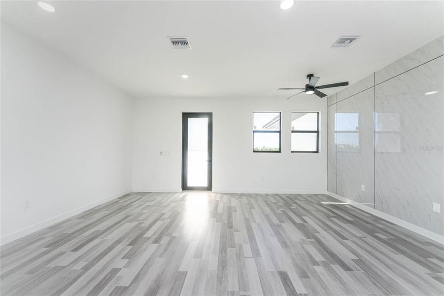 Spacious, unfurnished interior of a new home in , Port Charlotte (Image 24).