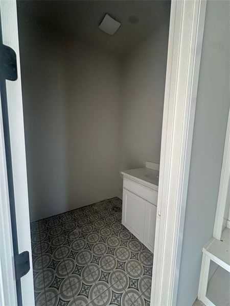 Guest Half Bath off the garage entrance