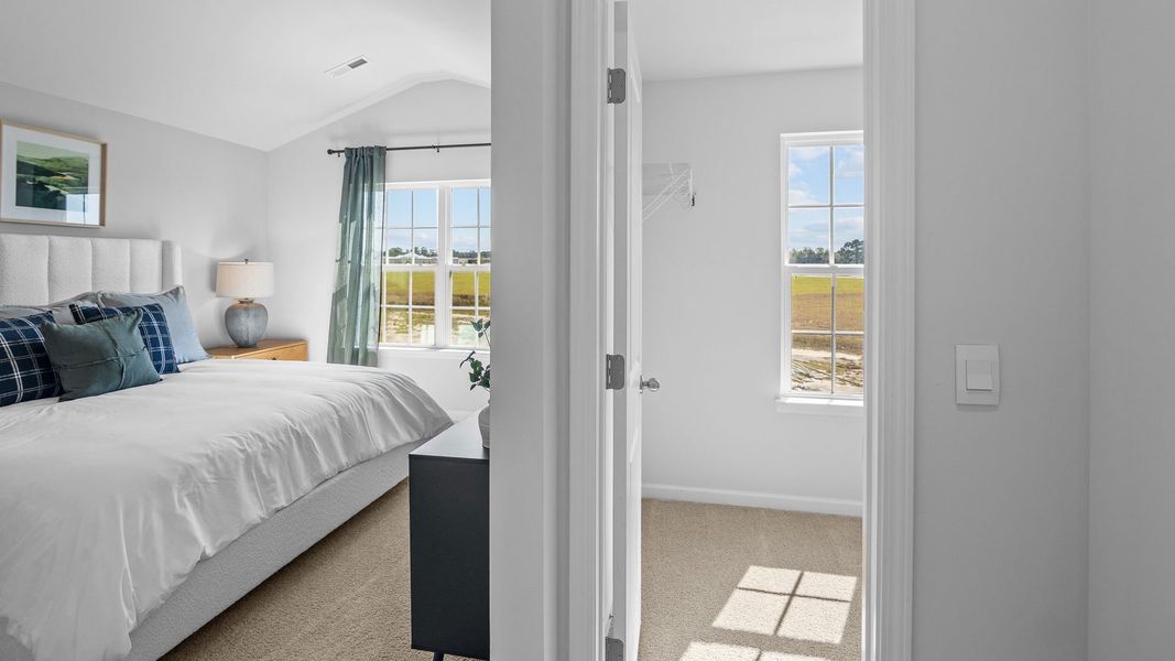 Furnished interior view inside a new home in The Townes at Ridgewood Farms, Winterville (Image 16).