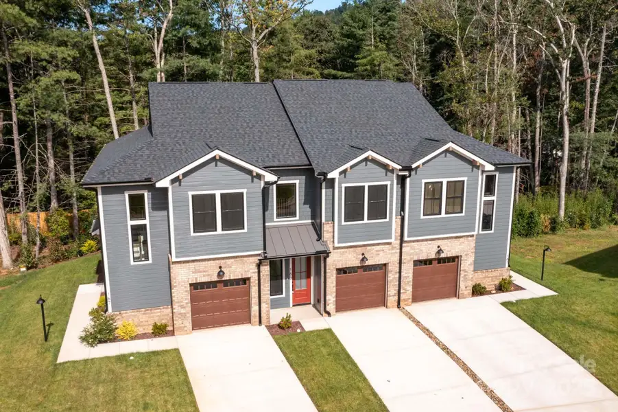 Front exterior of a new home in , Asheville, NC, highlighting curb appeal (Image 2).