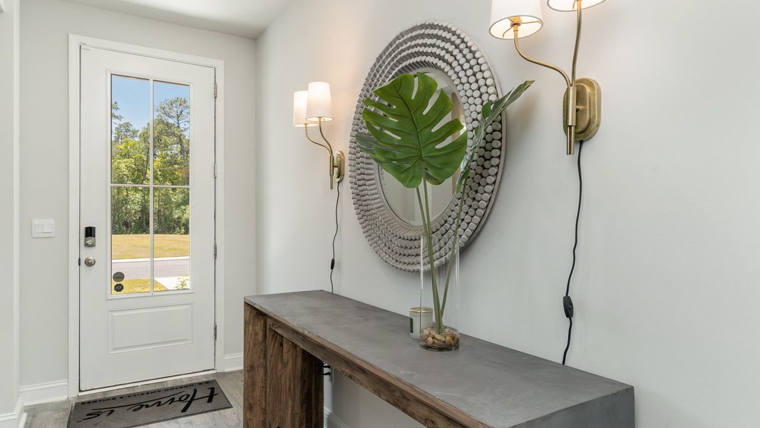 Representative furnished interior of a home built from the HARBOR OAK by D.R. Horton in Spring View Landing, Loris (Image 3).