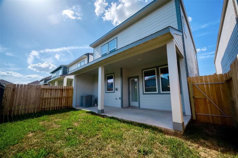 Front exterior of a new home in McClendon Park Village, Houston, TX, highlighting curb appeal (Image 30). Front exterior of a new home in McClendon Park Village, Houston, TX, highlighting curb appeal (Image 30).