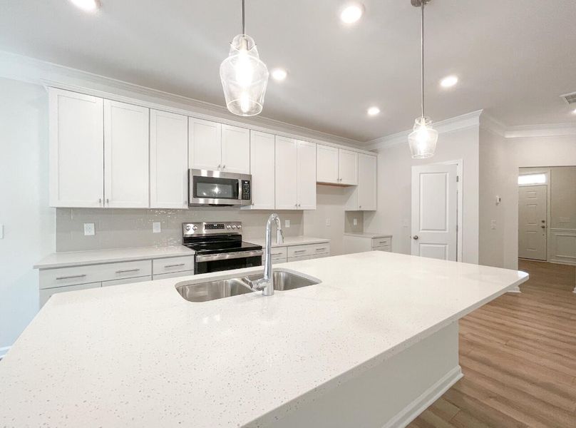 Furnished interior view inside a new home in Attenborough Townhomes, Piedmont (Image 7). Furnished interior view inside a new home in Attenborough Townhomes, Piedmont (Image 7).