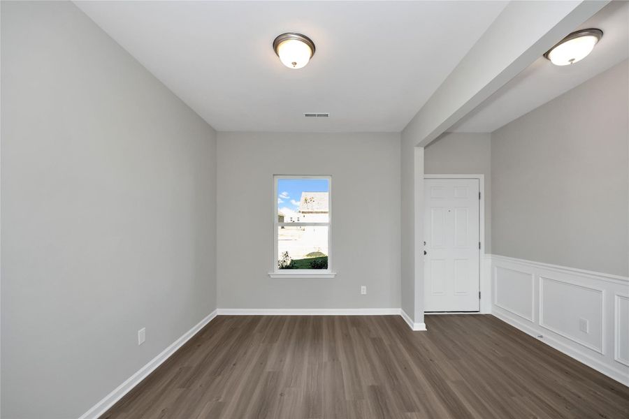 The Harrington- Foyer into Study (French doors not pictured). Sample image for illustration; upgrades, options, and colors may vary. The Harrington- Foyer into Study (French doors not pictured). Sample image for illustration; upgrades, options, and colors may vary.