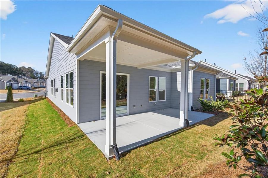 Exterior details and patio area of a home in The Reserve at Bells Ferry, Kennesaw (Image 18).
