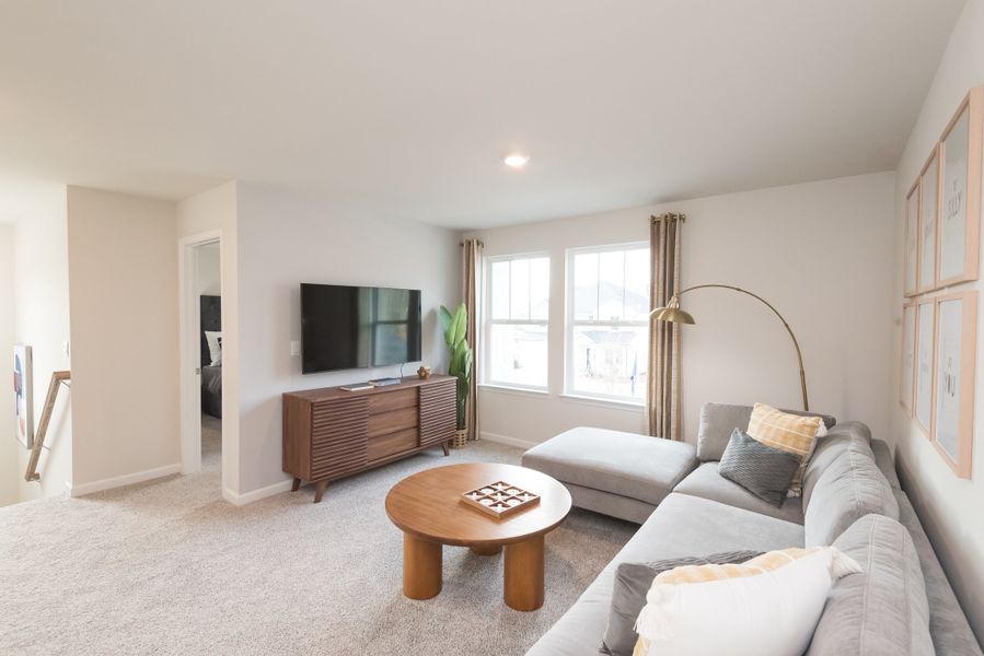 Furnished interior view inside a new home in Vines at Mill Creek - Estate Series, Braselton (Image 10).