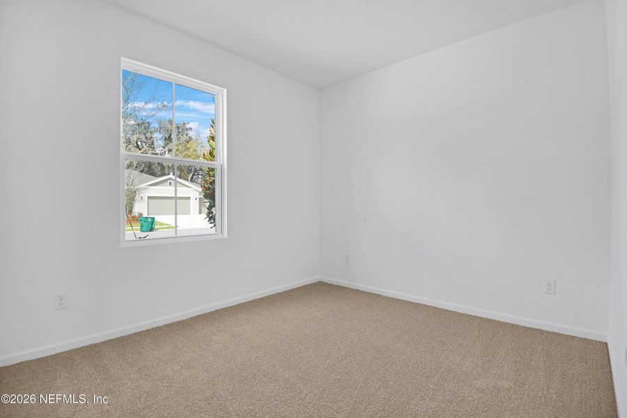 Spacious, unfurnished interior of a new home in Seasons at Grandview Gardens, Deland (Image 17).