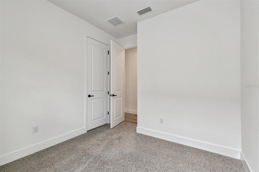 Spacious, unfurnished interior of a new home in The Peninsula at Rhodine Lake, Riverview (Image 25).