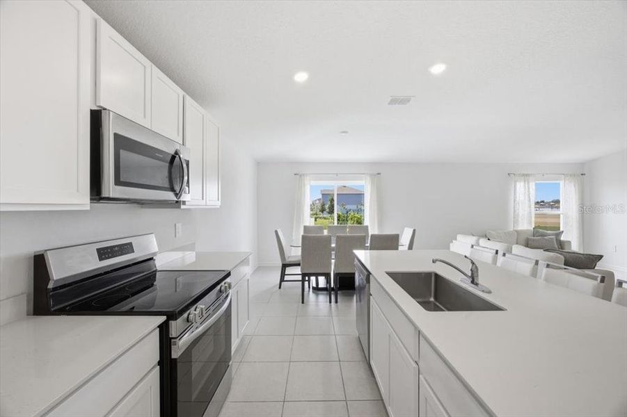 Furnished interior view inside a new home in Hunt Club Groves, Lake Wales (Image 11).