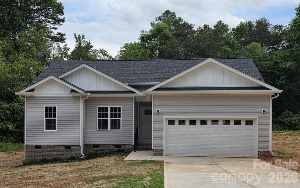 Front exterior of a new home in , Bessemer City, NC, highlighting curb appeal (Image 1). Front exterior of a new home in , Bessemer City, NC, highlighting curb appeal (Image 1).