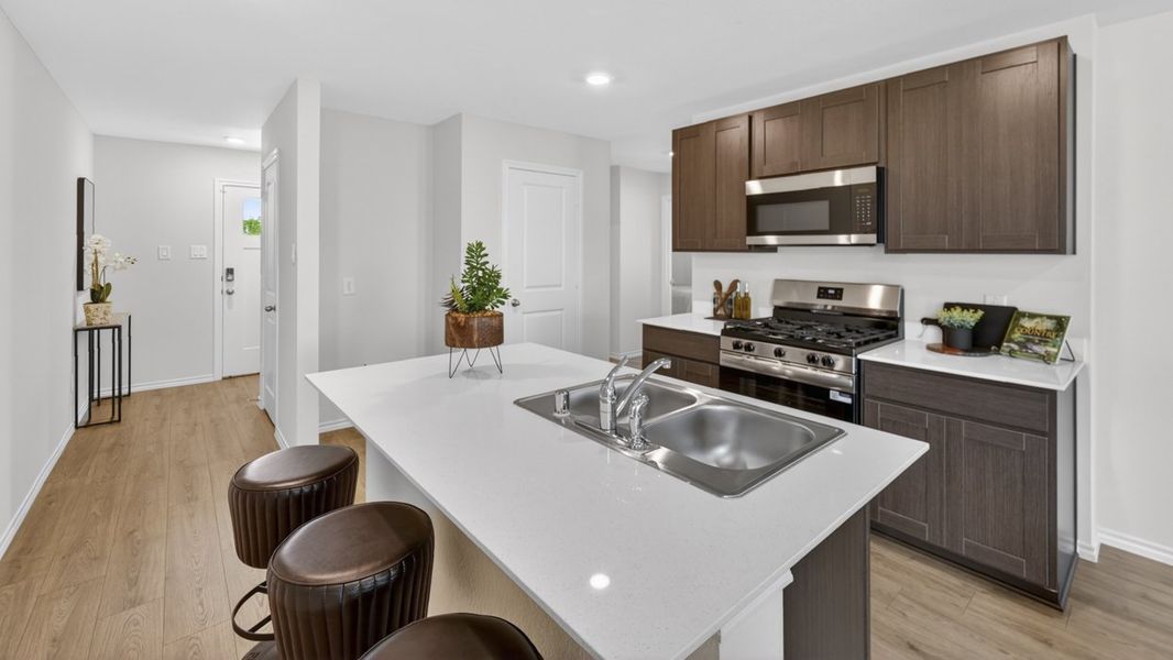 Representative furnished interior of a home built from the Atlanta by D.R. Horton in The Hills of Sherman, Sherman (Image 6).