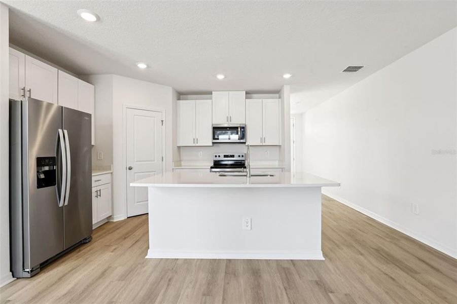 Furnished interior view inside a new home in Benton Hills - Classic Series, Brooksville (Image 6). Furnished interior view inside a new home in Benton Hills - Classic Series, Brooksville (Image 6).