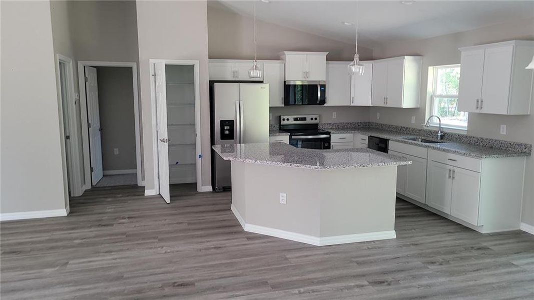 Furnished interior view inside a new home in , Dunnellon (Image 3).
