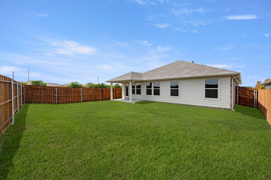 Front exterior of a new home in Terra Vella, Haslet, TX, highlighting curb appeal (Image 24). Front exterior of a new home in Terra Vella, Haslet, TX, highlighting curb appeal (Image 24).