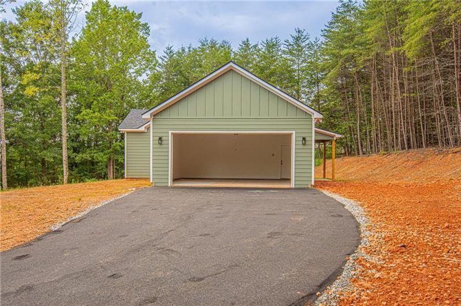 Front exterior of a new home in , Dahlonega, GA, highlighting curb appeal (Image 2).