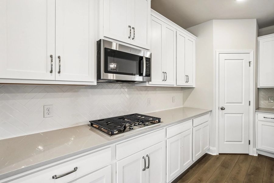 Kitchen featuring AW Collection® Timeless w/gas cooktop