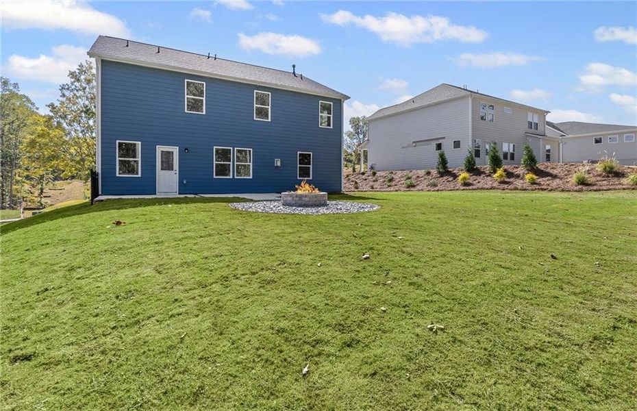 Exterior details and patio area of a home in Watermist at Mirror Lake, Villa Rica (Image 3).