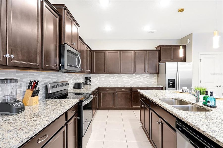 Furnished interior view inside a new home in Windsor Island Resort, Davenport (Image 38).