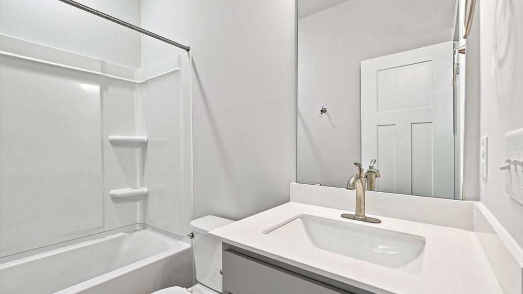 Top-notch bathroom with current fixtures, tasteful materials, and elevated charm Top-notch bathroom with current fixtures, tasteful materials, and elevated charm