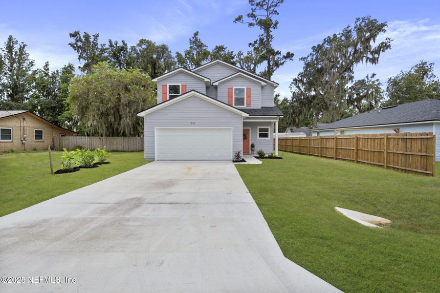 Front exterior of a new home in , Fleming Island, FL, highlighting curb appeal (Image 21).