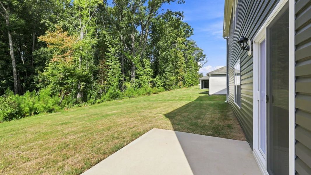 Exterior details and patio area of a home in Bentley Park, Greenwood (Image 3).