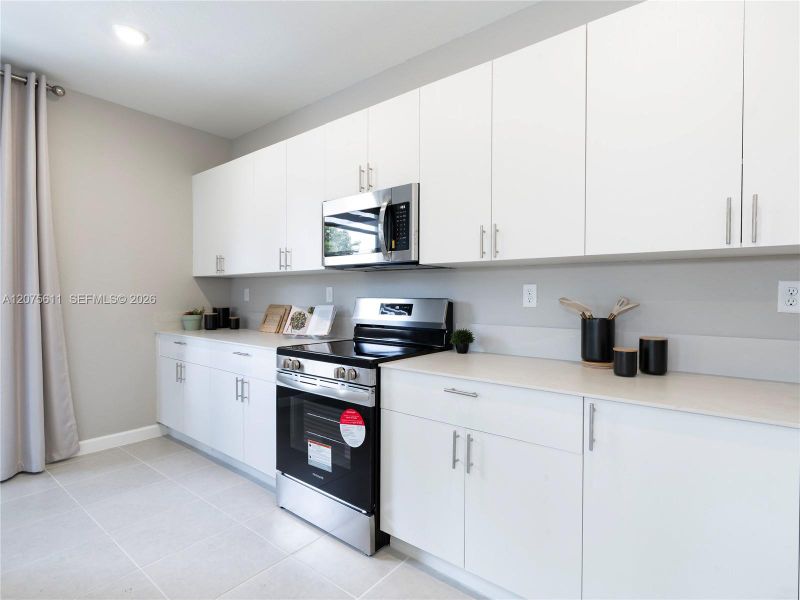 Furnished interior view inside a new home in Wildwood Groves, Miami (Image 28).