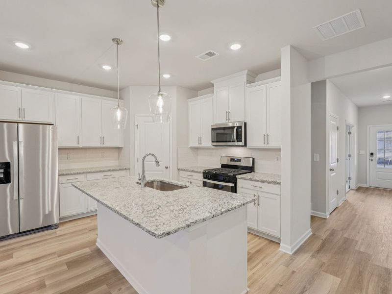 Furnished interior view inside a new home in Vines at Mill Creek - Estate Series, Braselton (Image 6).