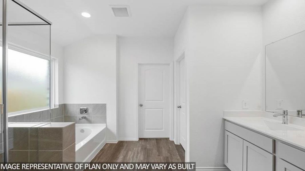 Furnished interior view inside a new home in Sunterra, Katy (Image 11).