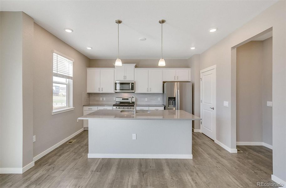 Furnished interior view inside a new home in Settlers Crossing, Commerce City (Image 8).