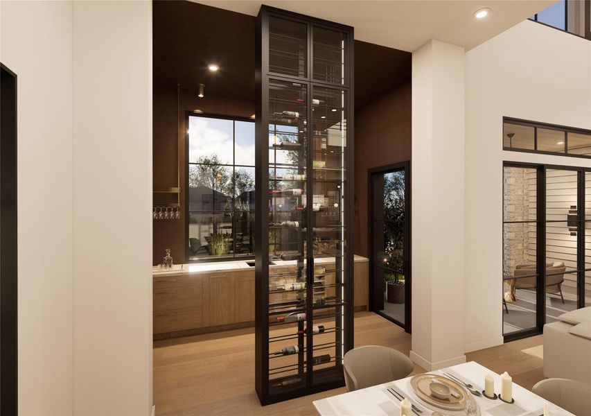 More than storage, this vertical wine gallery is a statement in refined living. Positioned between the dining room and wet bar, it anchors the space with modern sophistication—turning every bottle into part of the home’s design narrative. More than storage, this vertical wine gallery is a statement in refined living. Positioned between the dining room and wet bar, it anchors the space with modern sophistication—turning every bottle into part of the home’s design narrative.