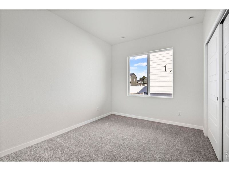 Spacious, unfurnished interior of a new home in Liberty Draw, Evans (Image 10).