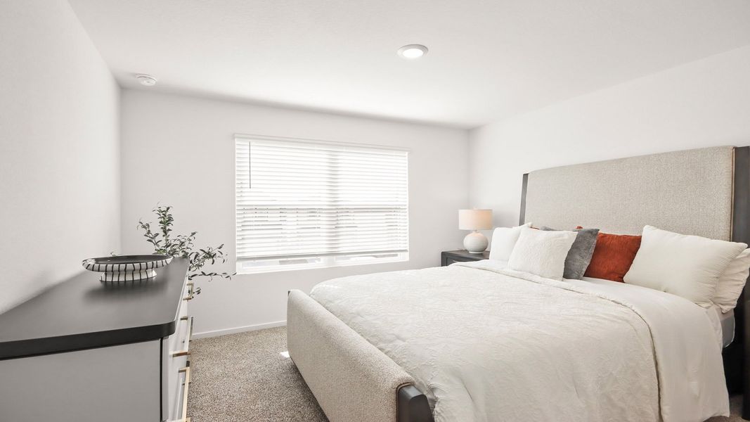 Representative furnished interior of a home built from the 1293 by D.R. Horton in Bridges on Lake Houston Villas, Humble (Image 8).