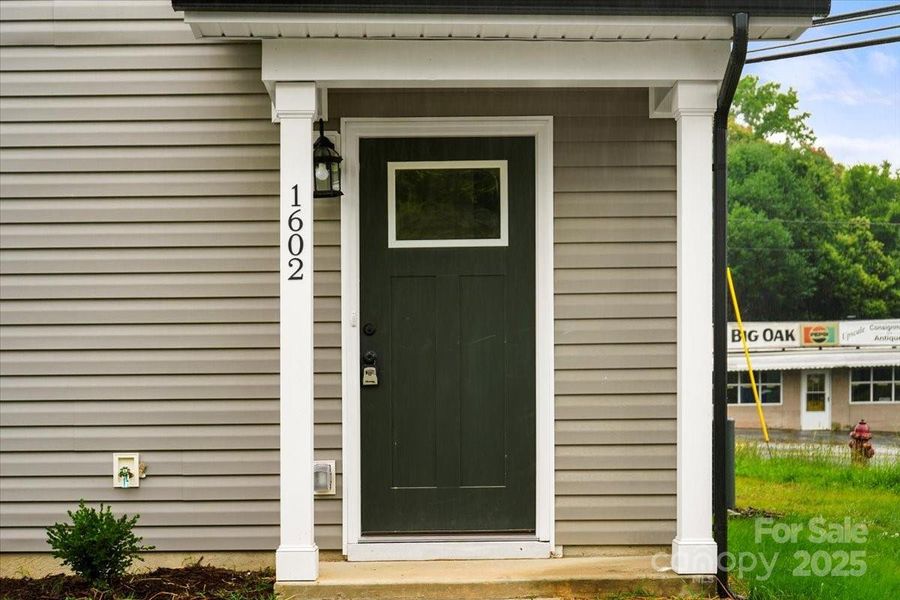 Front exterior of a new home in , Albemarle, NC, highlighting curb appeal (Image 18).