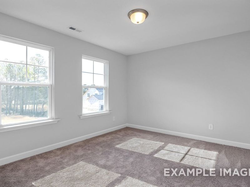 Spacious, unfurnished interior of a new home in Woodland Crossing, Zebulon (Image 16).