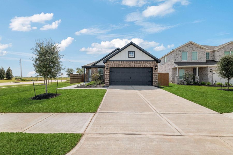 Front exterior of a new home in Emberly, Beasley, TX, highlighting curb appeal (Image 1). Front exterior of a new home in Emberly, Beasley, TX, highlighting curb appeal (Image 1).