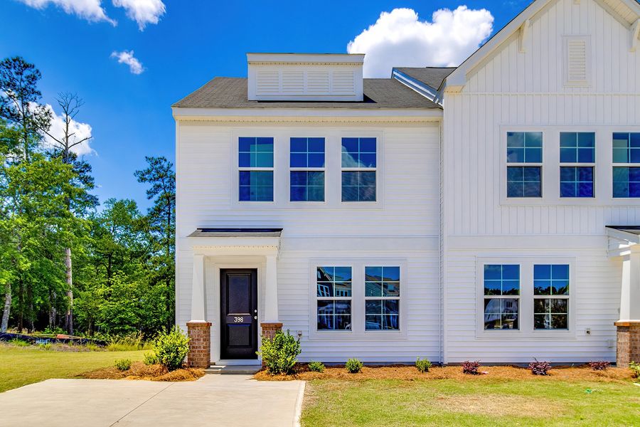 Front exterior of a new home in Padgett Commons, Hopkins, SC, highlighting curb appeal (Image 1). Front exterior of a new home in Padgett Commons, Hopkins, SC, highlighting curb appeal (Image 1).