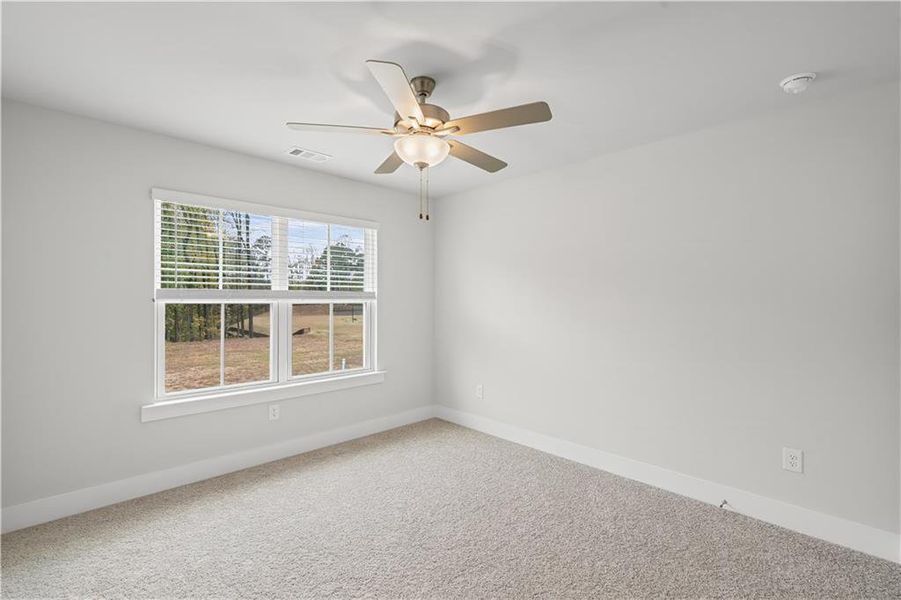 Spacious, unfurnished interior of a new home in Rose Creek, Cumming (Image 39).