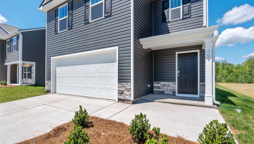 Exterior details and patio area of a home in Gibson Grove, Laurens (Image 2). Exterior details and patio area of a home in Gibson Grove, Laurens (Image 2).