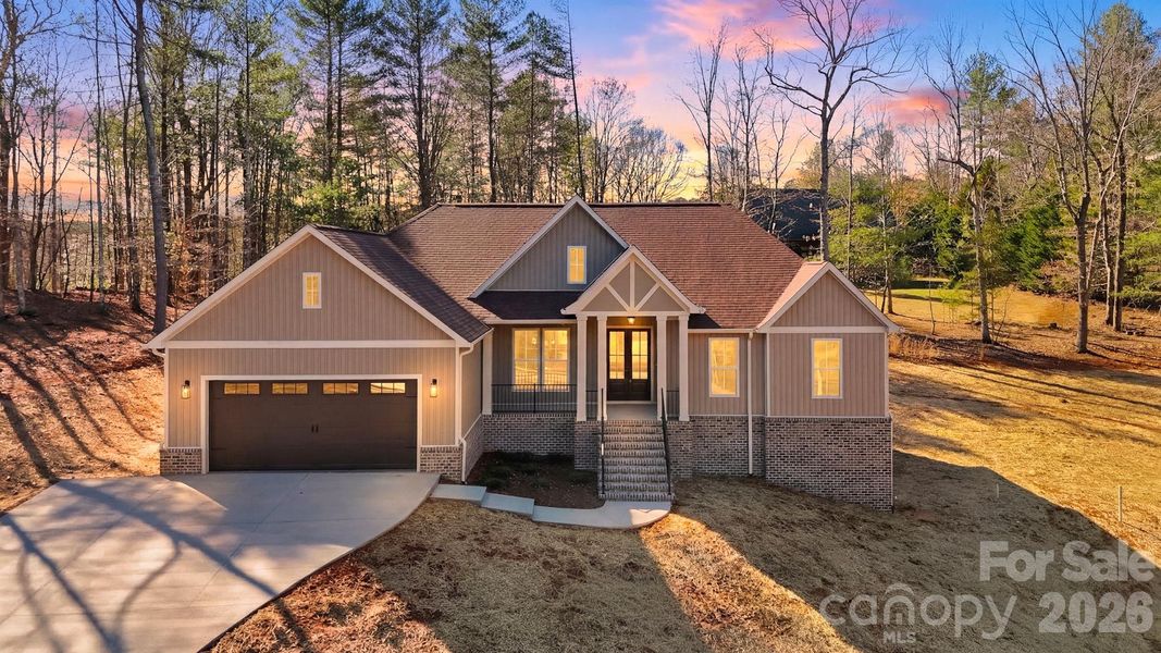 Front exterior of a new home in , Granite Falls, NC, highlighting curb appeal (Image 24). Front exterior of a new home in , Granite Falls, NC, highlighting curb appeal (Image 24).