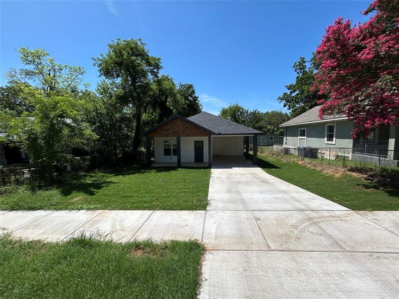 Front exterior of a new home in , Denison, TX, highlighting curb appeal (Image 16). Front exterior of a new home in , Denison, TX, highlighting curb appeal (Image 16).