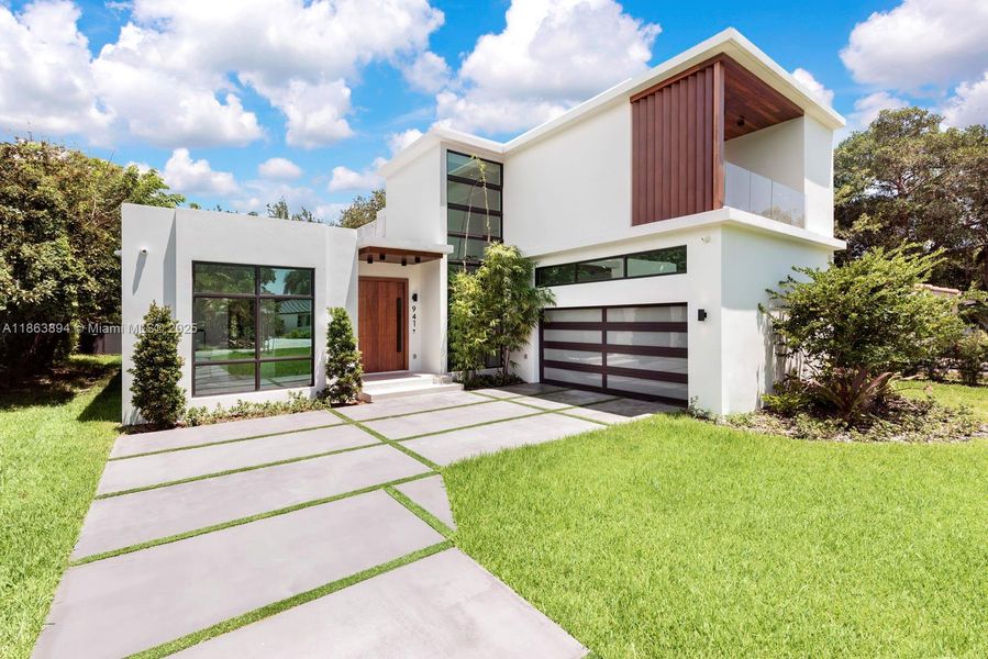 Front exterior of a new home in , Miami Shores, FL, highlighting curb appeal (Image 1).