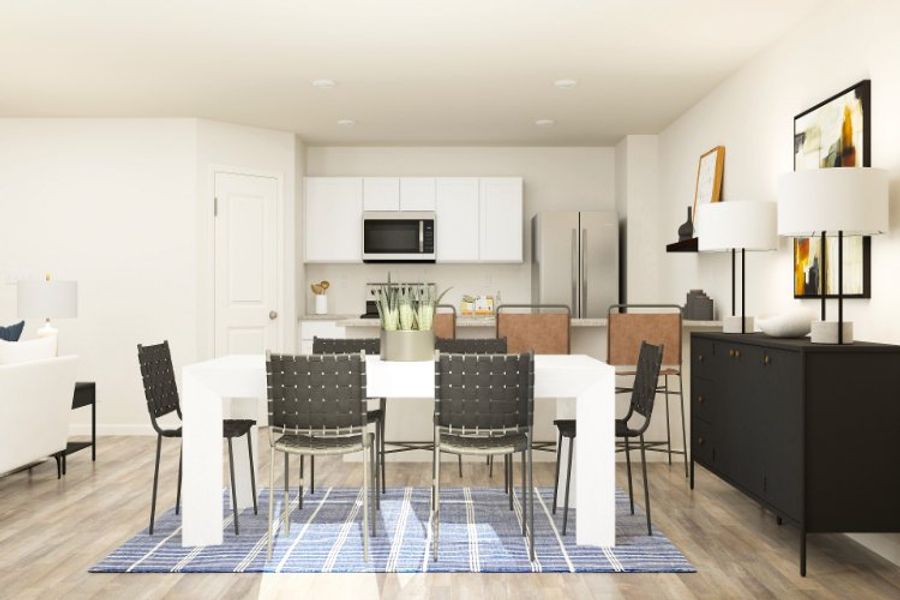 A kitchen with a dining table and chairs. A kitchen with a dining table and chairs.