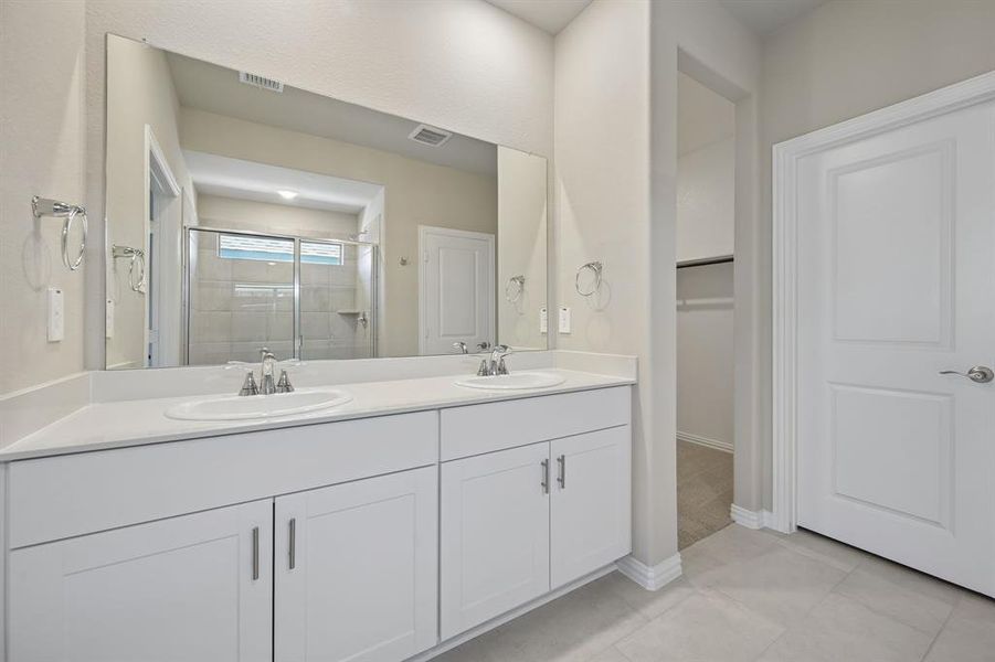Furnished interior view inside a new home in Parks at Foster Crossing - Signature Series, Anna (Image 12). Furnished interior view inside a new home in Parks at Foster Crossing - Signature Series, Anna (Image 12).