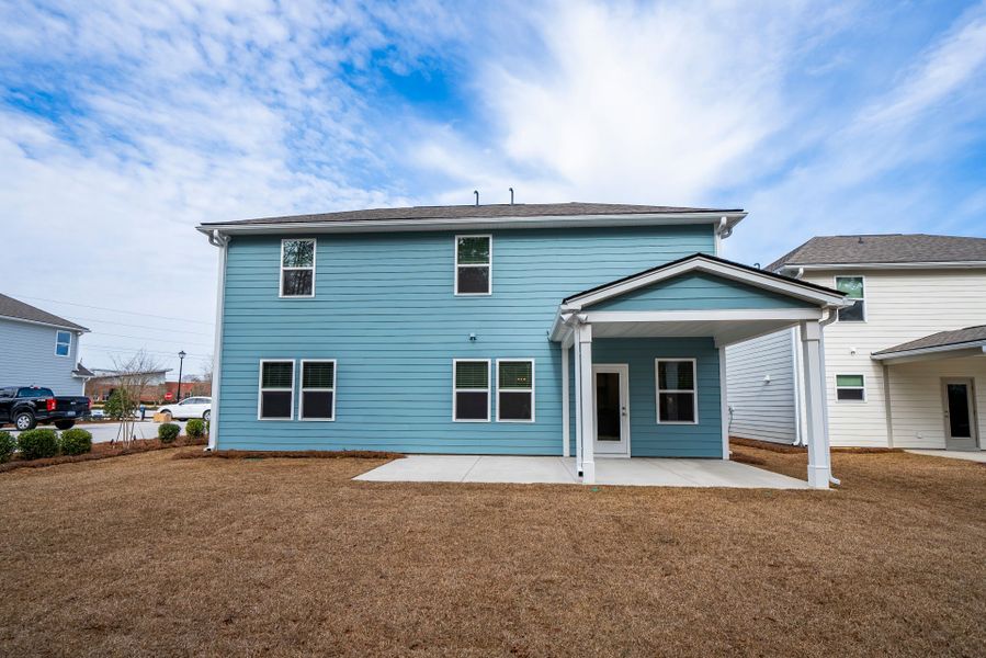 Exterior details and patio area of a home in Monroe Preserve, Chapin (Image 33).