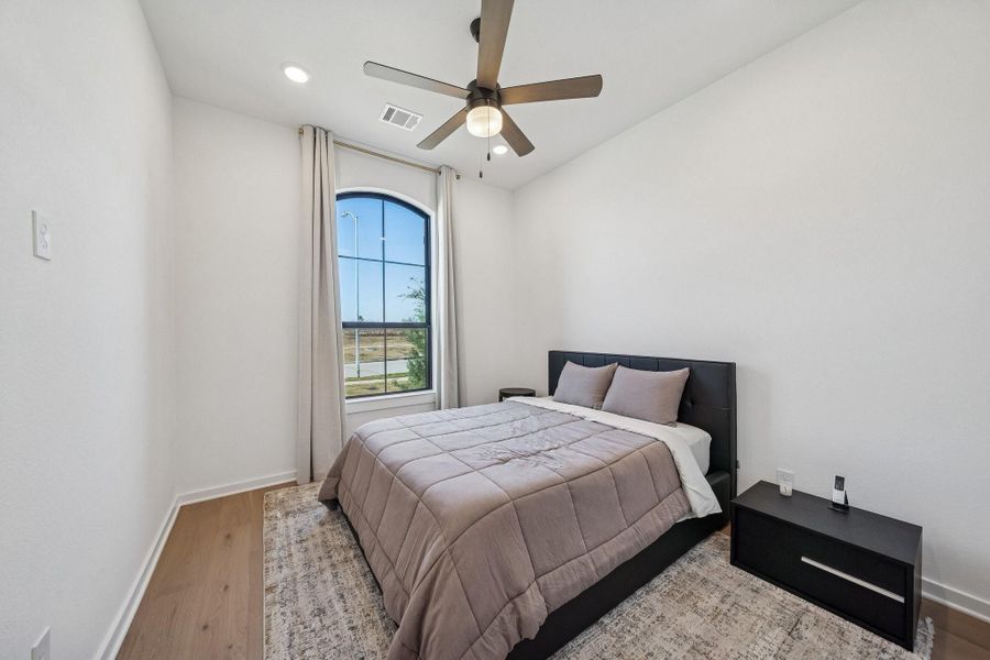 Bedroom #2 located on the 1st floor  overlooks the front yard.