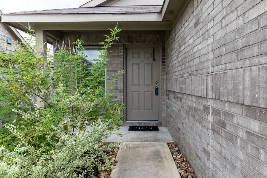 Front exterior of a new home in Burnet Fields at Baytown Crossings, Baytown, TX, highlighting curb appeal (Image 20). Front exterior of a new home in Burnet Fields at Baytown Crossings, Baytown, TX, highlighting curb appeal (Image 20).